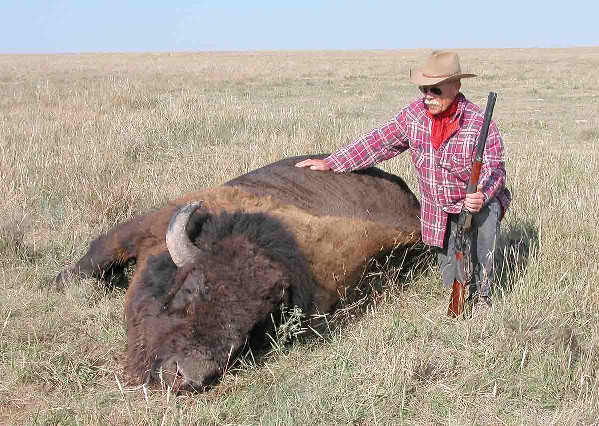 The Model 1876 Winchester .50-95 WCF is a relatively large rifle, but it is dwarfed by the horn of a mature bison.